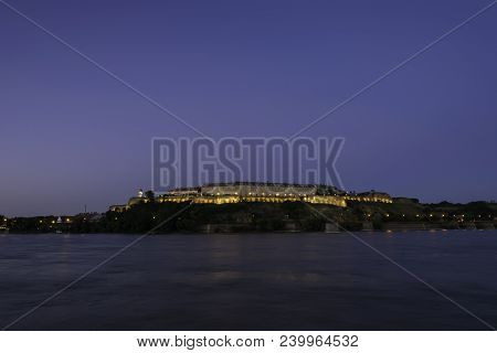 Petrovaradin Fortress In Novi Sad. Petrovaradin Fortress Over Danube River. Evening In Novi Sad. Pet