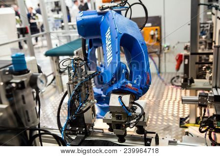 Hannover, Germany - April, 2018: Yaskawa Robot Arm On Messe Fair In Hannover, Germany
