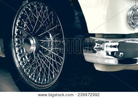 Spoked Wheel Of A White Luxury Car. Antique Automovile And Empty Copy Space For Editor Text.