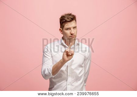 Secret, Gossip Concept. Young Man Whispering A Secret Behind His Hand. Businessman Isolated On Trend