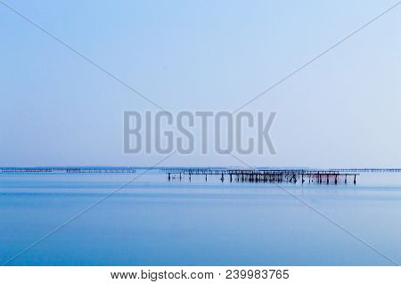 Shellfish Farming From Po River Lagoon, Italy. Scardovari Beach. Italian Rural Landscape