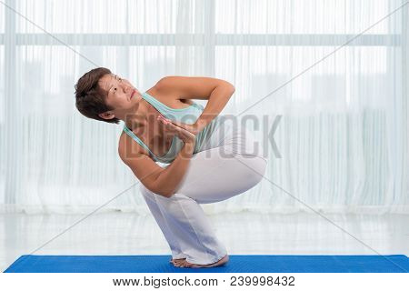Middle-aged Sporty Japanese Woman Exerising At Home