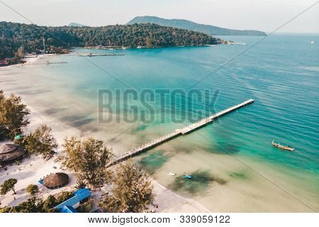 Island Koh Rong Samloem, Sihanoukville, Cambodia. Pier On The Beach Of Koh Rong Samloem Island In Ca