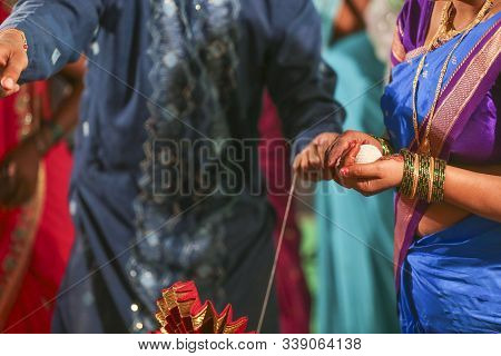 Indian Traditional Wedding: Women Hand In Haldi Ceremony