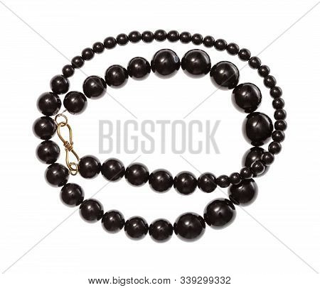 Top View Of Coiled Necklace From Polised Jet Stone (georgian Gagate) Isolated On White Background
