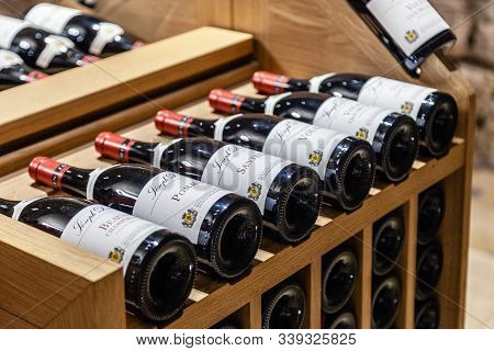 France Burgundy 2019-06-19 Store At Winery Joseph Drouhin. Wooden Rack With Famous Pinot Noir Red Wi