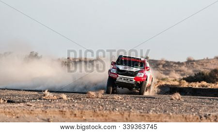 On The Track Practicing For Competition Zahedan With A Dakar Edition Race Car