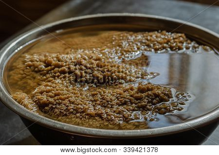 Raw Beef Stomach In A Bowl. A Piece Of Fresh Stomach In A Metal Bowl With Water. Beef Tripe. Side Vi