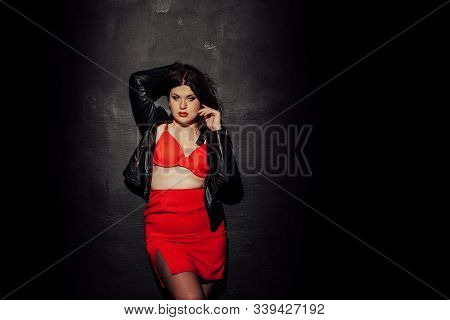 Fat Woman In Red Underwear In Black Room