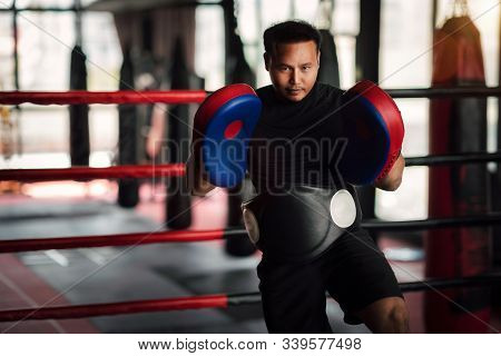 Asian Kickboxing Trainer In Boxing Gym, This Photo Can Use For Muy Thai, Thai, Sport, Fitness, Coach