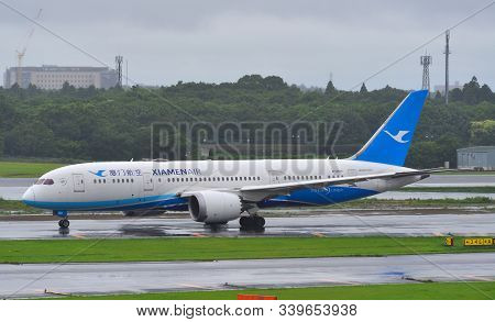 Tokyo, Japan - Jul 4, 2019.  B-2760 Xiamen Airlines Boeing 787-8 Dreamliner Taxiing On Runway Of Tok