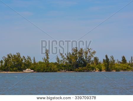 Abandoned Boat Beached By A Hurricane On Indian River Lagoon. Vero Beach, Indian River County, Flori