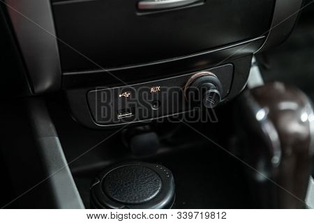 Novosibirsk, Russia - October 26, 2019:  Ssangyong Actyon, Close Up Of A Charging In The Car, Cigare