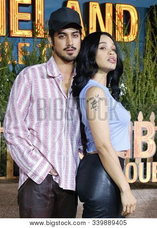 Avan Jogia and Cleopatra Coleman at the Los Angeles premiere of 'Zombieland Double Tap' held at the Regency Village Theatre in Westwood, USA on October 10, 2019.