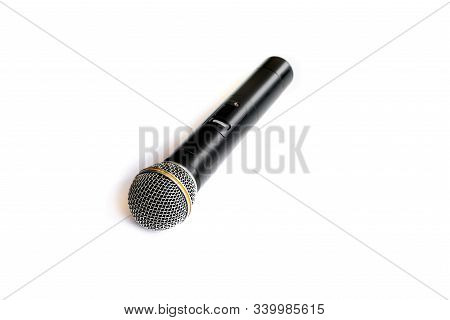 Black Wireless Microphone  Isolated On White Background.a Microphone Without A Physical Cable Connec