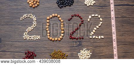 2022 New Year With Organic Beans; Red, Black, White, Green, Chickpeas And Adlay On Table. Goals, Hea