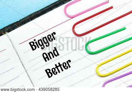 Colored Clicks, Notebooks With The Words Bigger And Better