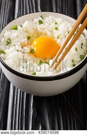 Tamago Kake Gohan Is A Popular Japanese Breakfast Food Consisting Of Cooked Japanese Rice Topped Wit