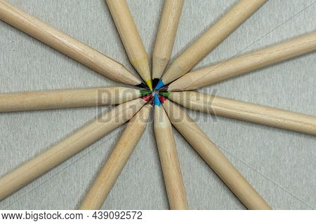 Colored Pencils In A Row Forming A Circle. Colored Pencils Of The Same Color.