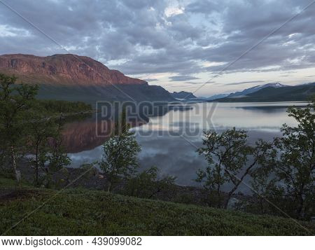 Beautiful Blue Pink Sunrise Over The Lake Lulealven In Saltoluokta In Sweden Lapland. Reflection Of 