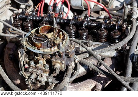 Disassembled Carburetor On Old Engine Without Top And Air Filter. Carburettor Motor Maintenance And 