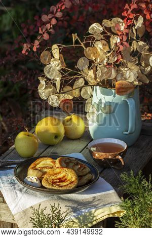 Whole Wheat Apple Pancakes Served With Tea In The Garden. Rustic Style.