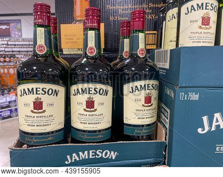 A Display Of Bottles Of Jameson Irish Whiksey  With Background Bokeh At A Binneys Liqour Store In Sp