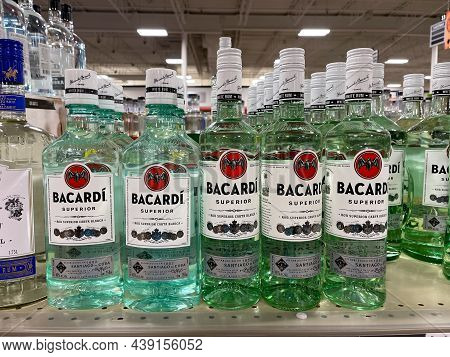 A Display Of Bottles Of Bacardi Rum Superior With Background Bokeh At A Binneys Liqour Store In Spri