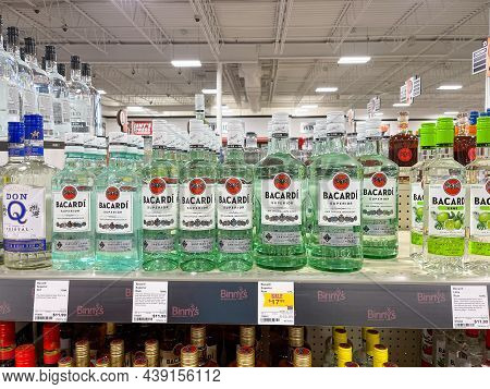 A Display Of Bottles Of Bacardi Rum Superior With Background Bokeh At A Binneys Liqour Store In Spri