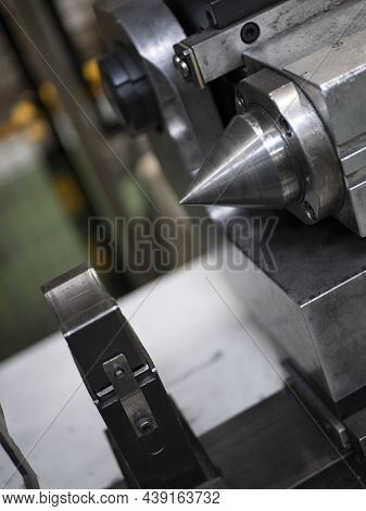 The Tailstock Of A Lathe, Close Up. Processing Of Parts. Manufacturing Equipment