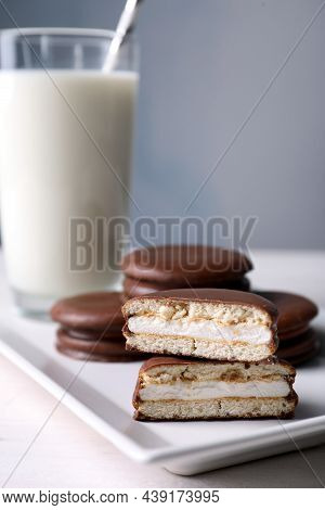 Tasty Choco Pies And Milk On White Wooden Table