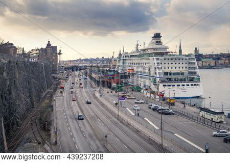 Stockholm, Sweden - 04.15.2017: Huge Birka Ferry Docked In The Port Of Stockholm With Cityscape And 