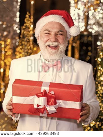 Bearded Grandfather Man Celebrate Christmas. Christmas Party. Senior Man With Beard. Christmas Gift.