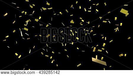 Digital image of gold confetti falling against a black background
