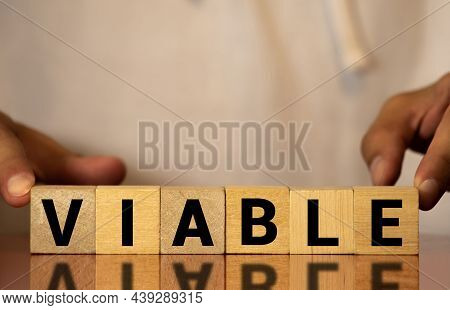 Viable Colorful Word On The Wooden Background.