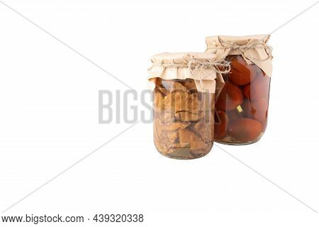 Homemade Preparations For The Winter Of Ctomatoes And Mushrooms. Autumn. Glass Jar With Tomatoes  An
