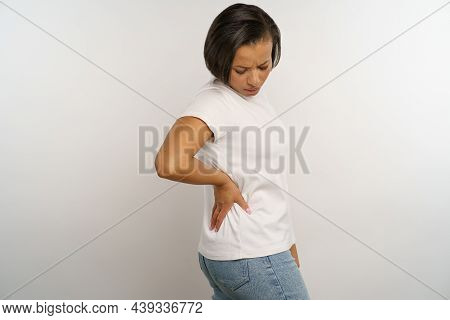 Unhappy Woman Suffer From Backpain, Kidney Stones Or Inflammation. Unwell Young Black Female Press H