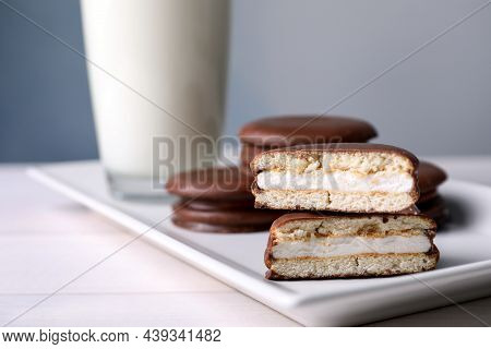 Tasty Choco Pies And Milk On White Wooden Table, Closeup View. Space For Text