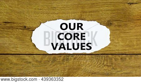 Our Core Values Symbol. Words 'our Core Values' On White Paper. Beautiful Wooden Background. Busines