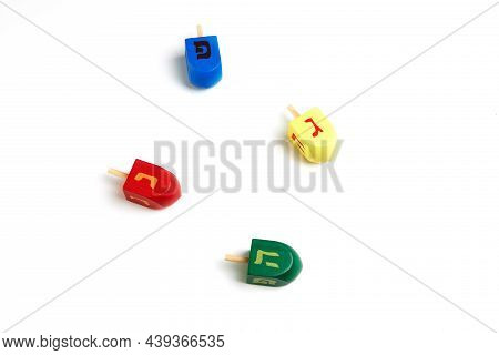 Happy Hanukkah And Hanukkah Sameach - Traditional Jewish Spinning Tops With Hebrew Letters On White 