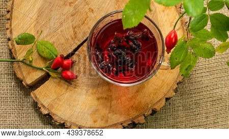 Antioxidant Mug With Rustic Red Rosehip Tea. Herbal Tincture Red Tea, Red Berry Homopathy