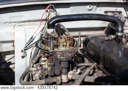 Disassembled Carburetor On Old Engine Without Top And Air Filter. Carburettor Motor Maintenance And 