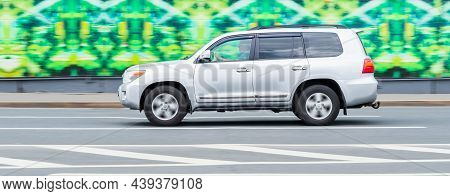 Toyota Land Cruiser 200 Suv Model On The Street In Motion. Moscow, Russia - September 2021