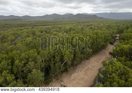 A Sandy Creek Bed Through Thick Bushland With Very Little Water, Drone Aerial