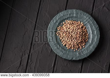 Dry Brown Lentils In A Wooden Bowl - Pardina