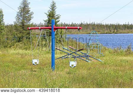 Views Of An Unmaintained Playground By A Lake