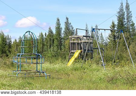 An Unmaintained Abandoned Playground At A Campsite