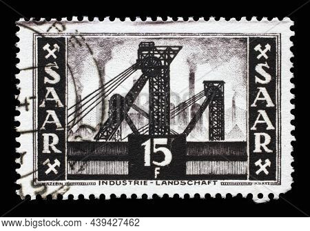 ZAGREB, CROATIA - JULY 02, 2014: Stamp from Germany area Saar shows industrial landscape of the mining industry, circa 1952