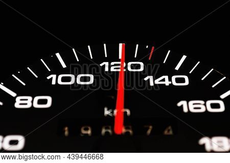 Car Speedometer With The Needle Pointing A High Speed At Blackground, Speedometer With A Red Arrow I
