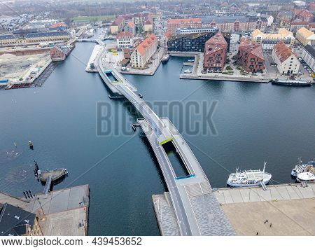Copenhagen, Denmark - April 7, 2020: Aerial Drone View Of The Modern Inner Harbor Bridge.